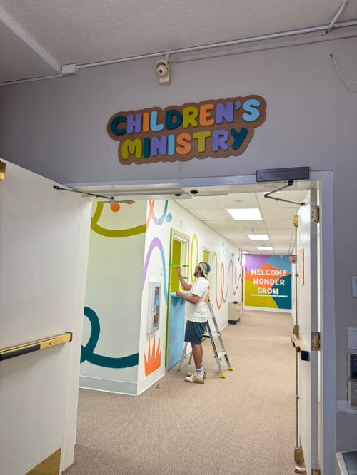 Artists Painting a Children's Mural